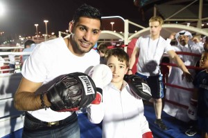 Amir Khan puts youngsters through some training in Doha 2015 Fanzone 