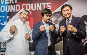The President of the Qatar Boxing Federation Yousuf Ali Al Kazim and AIBA President Dr Ching-Kuo with Manny Pacquiao